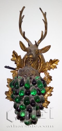 اباليك نحاس على شكل وجه غزال يحمل عنقود عنب