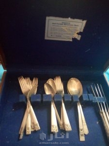 ملاعق وسكاكين وشوك فضيه