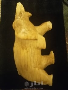 an elephant carved from African ivory 4