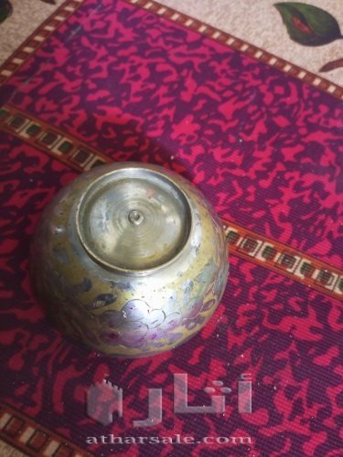 A copper cup with Ayat al-Kursi on it is more than 150 years old