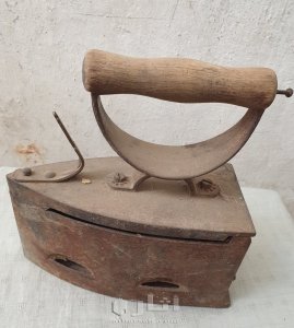 مكواة بالجمر