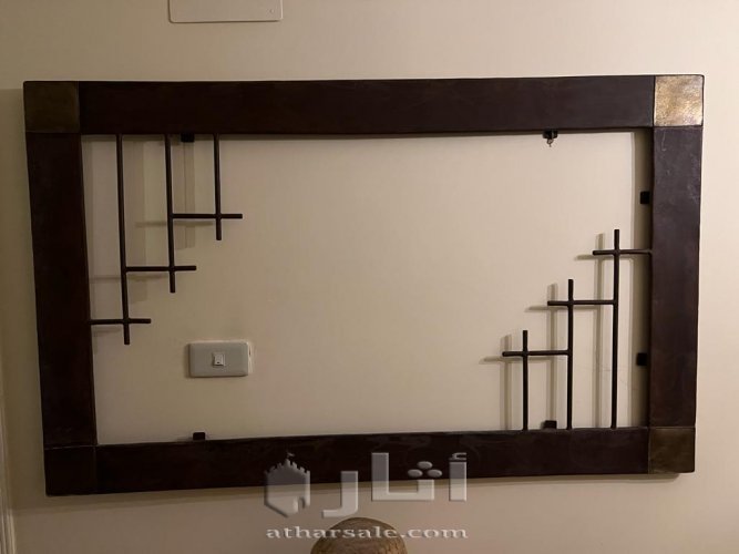 اطار من الحديد والناس