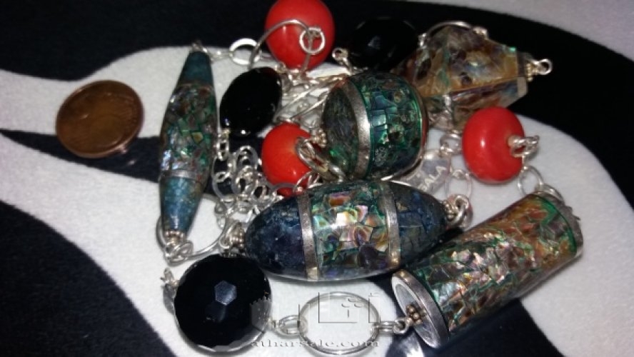 عقد فضه وصدف وشعاب مرجان