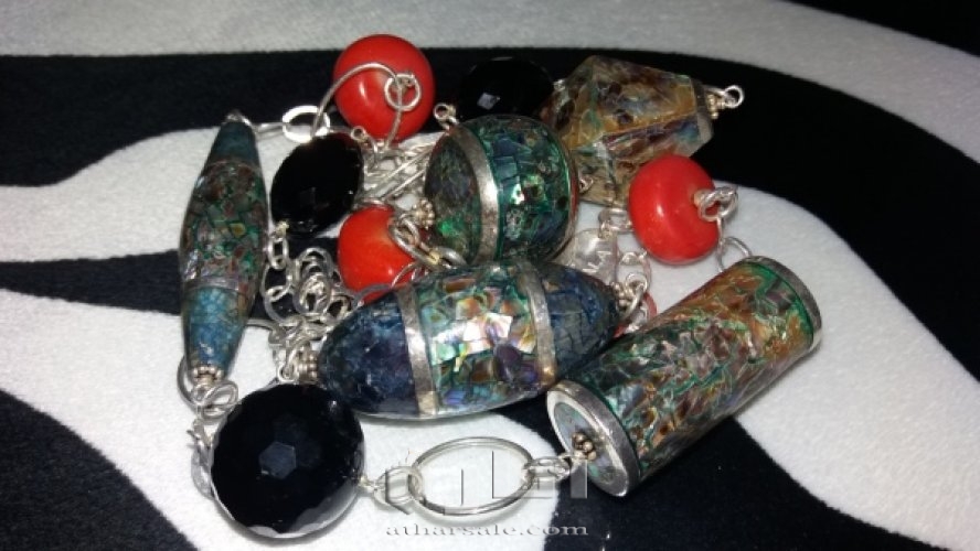 عقد فضه وصدف وشعاب مرجان