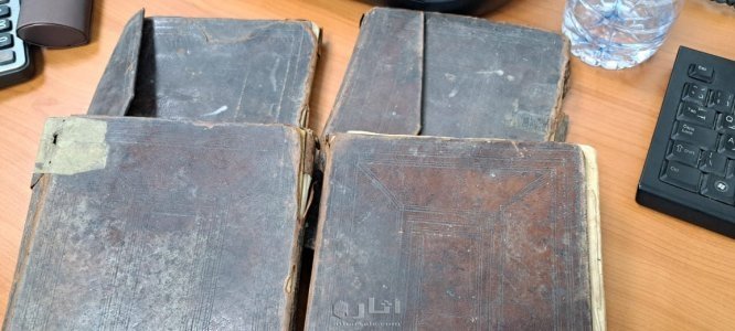 مصحف مجزء في اربع كتب  بكتابة يدوية في عام 1350 3