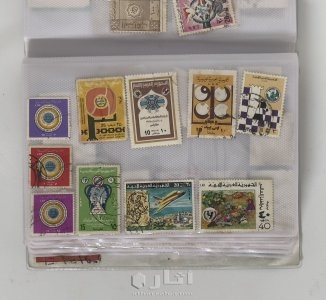 ‏كتاب يحتوي على مجموعة كبيرة من الطوابع البريدية القديمة جدًا 7