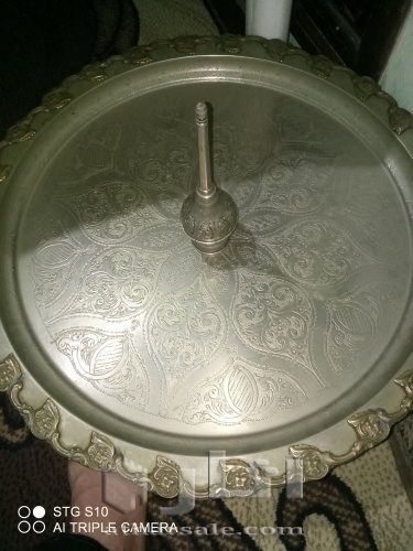 اواني منزلية قديمة من الفضة والنحاس