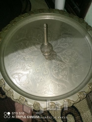 اواني منزلية قديمة من الفضة والنحاس