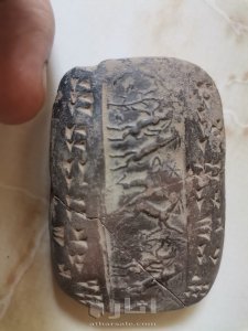 Ugaritian stamp, The Ugaritic writing system is a cuneiform abjad (consonantal alphabet) used from around either 1400 BCE or 1300 BCE for Ugaritic ختم اوغاريتي