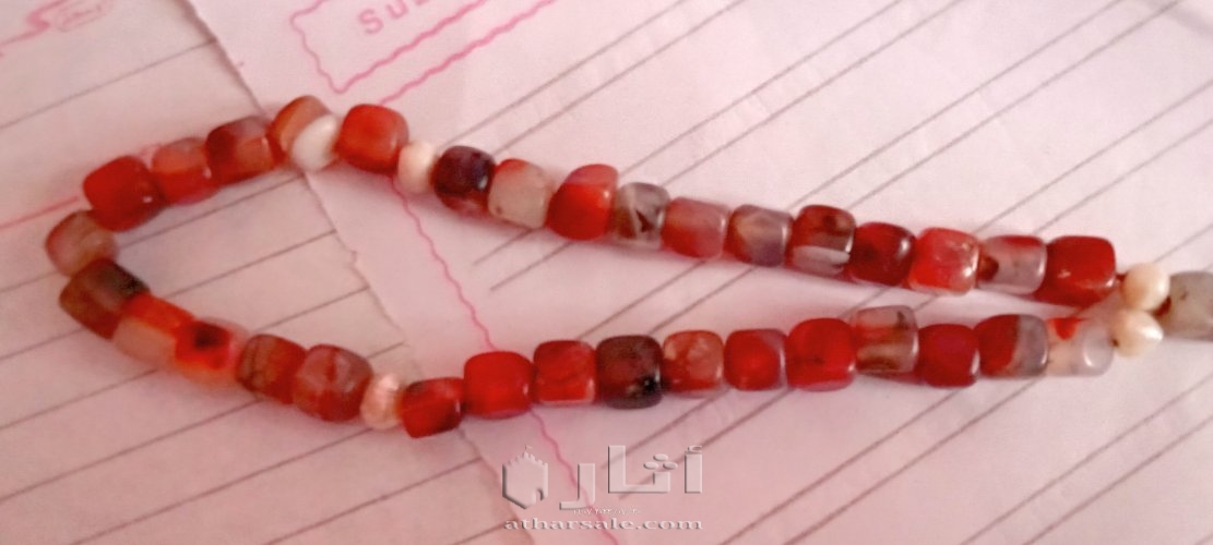 سبحه عقيق عسلى يمنى 35 حبه مطعمه بحبات اللؤلؤ الطبيعى