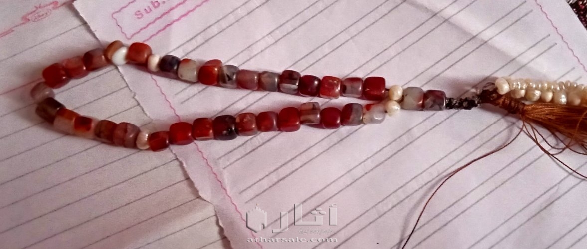 سبحه عقيق عسلى يمنى 35 حبه مطعمه بحبات اللؤلؤ الطبيعى