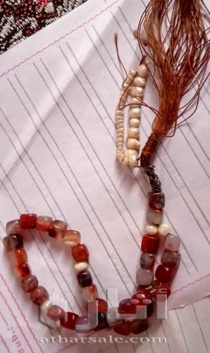 سبحه عقيق عسلى يمنى 35 حبه مطعمه بحبات اللؤلؤ الطبيعى