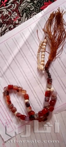 سبحه عقيق عسلى يمنى 35 حبه مطعمه بحبات اللؤلؤ الطبيعى