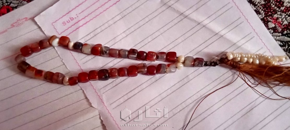 سبحه عقيق عسلى يمنى 35 حبه مطعمه بحبات اللؤلؤ الطبيعى