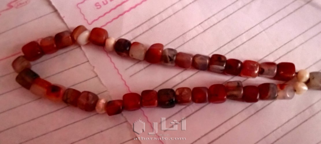 سبحه عقيق عسلى يمنى 35 حبه مطعمه بحبات اللؤلؤ الطبيعى