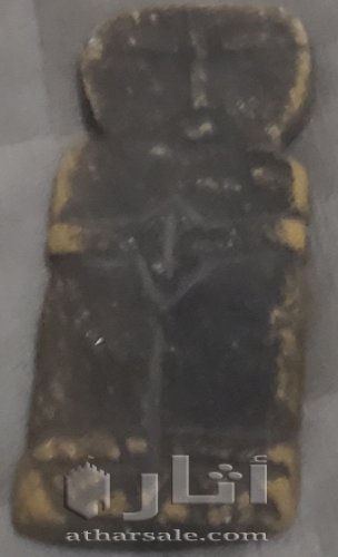 تمثال من الحضارة السبئية القديمة منقوش عليه باللغه السبئية القديمه