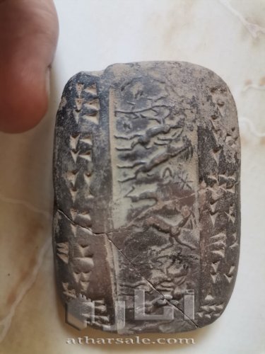 Ugaritian stamp, The Ugaritic writing system is a cuneiform abjad (consonantal alphabet) used from around either 1400 BCE or 1300 BCE for Ugaritic ختم اوغاريتي