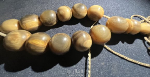 Antique rosary, large giraffe horn and rhinoceros