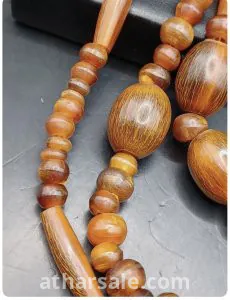 عقد  قديم من قرن الزراف وحيد القرن 3