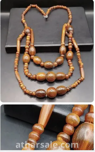 عقد  قديم من قرن الزراف وحيد القرن