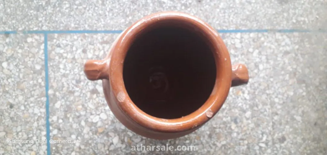 طنجية  لي طهي من طين