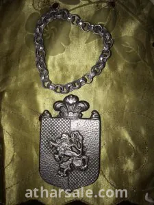 Royal emblem of silver, weighing 55 grams