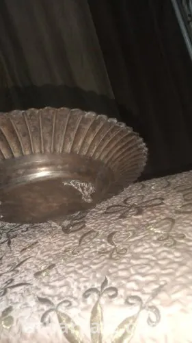 زجاجه عطر من النحاس والفضة