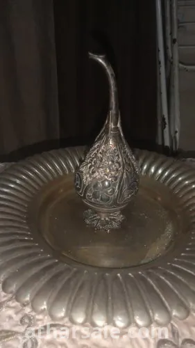 زجاجه عطر من النحاس والفضة