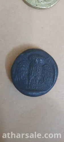 عملة البومة