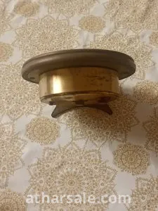 A rare Suiza 8 watch made of brass