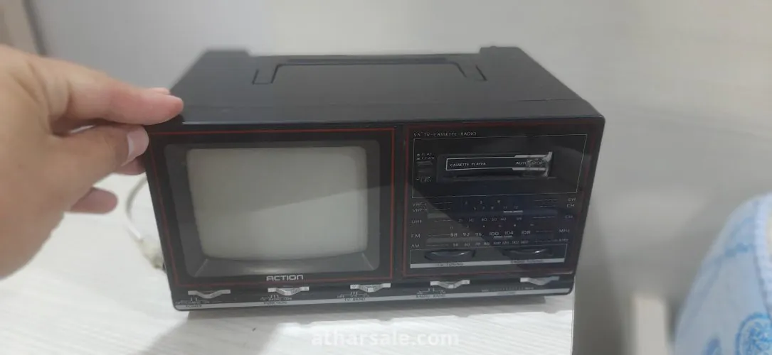 Old 5.5 inch black and white TV, radio and cassette player from 1985 action 6030t