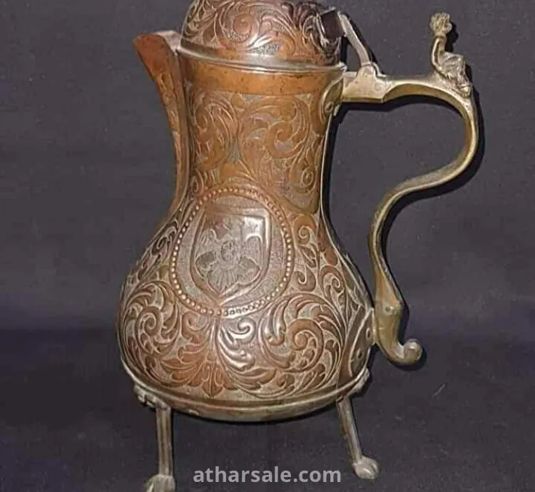 اثار اسلاميه قديمه من العصر الاندلسي قطعه تجمع بين الفن الاسلامى والفن الاندلسى  المتمثل فى شعار  اسبانيا بلاد الأندلس قطعه نادره تجمع بين ثقفتين