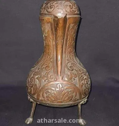 اثار اسلاميه قديمه من العصر الاندلسي قطعه تجمع بين الفن الاسلامى والفن الاندلسى  المتمثل فى شعار  اسبانيا بلاد الأندلس قطعه نادره تجمع بين ثقفتين