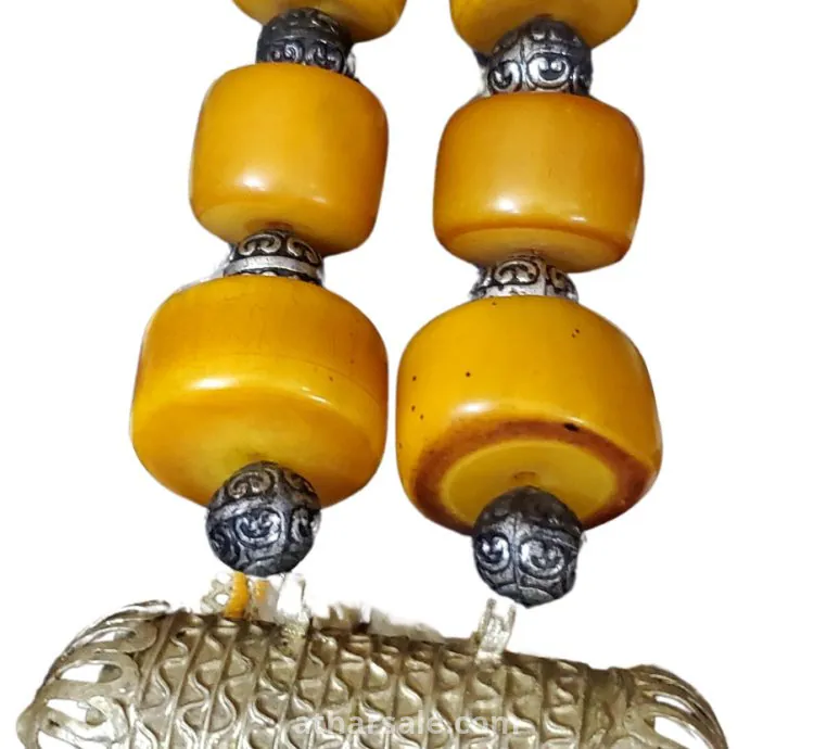 Antique necklaces decorated with antique bakelite beads. Necklaces are about 100 years old.