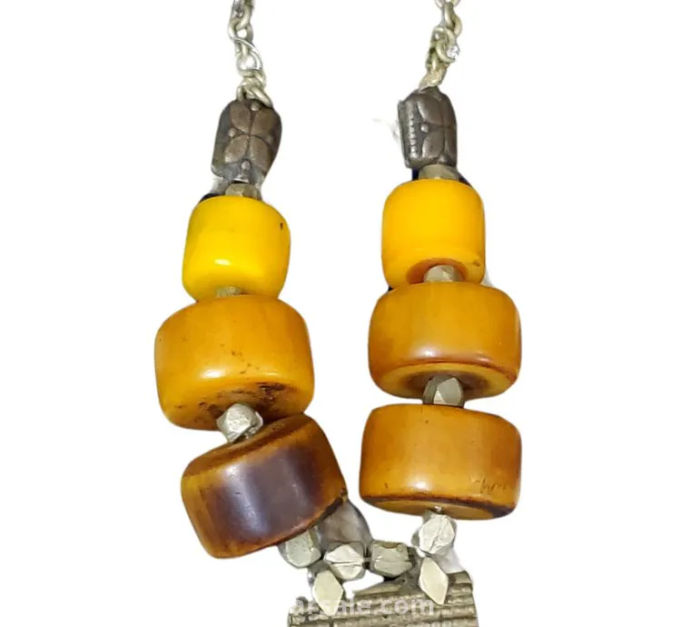 Antique necklaces decorated with antique bakelite beads. Necklaces are about 100 years old.