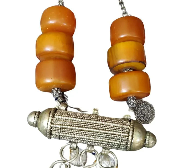 Antique necklaces decorated with antique bakelite beads. Necklaces are about 100 years old.