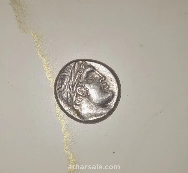 عملة اثريه فضيه