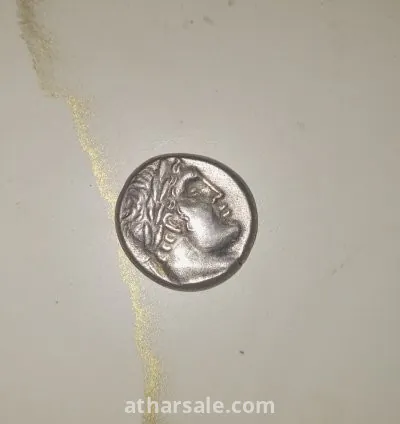 عملة اثريه فضيه