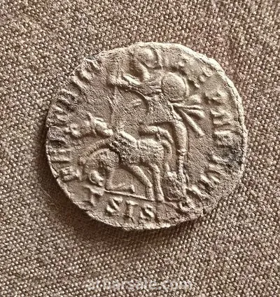 ancient Roman coin made of yellow copper