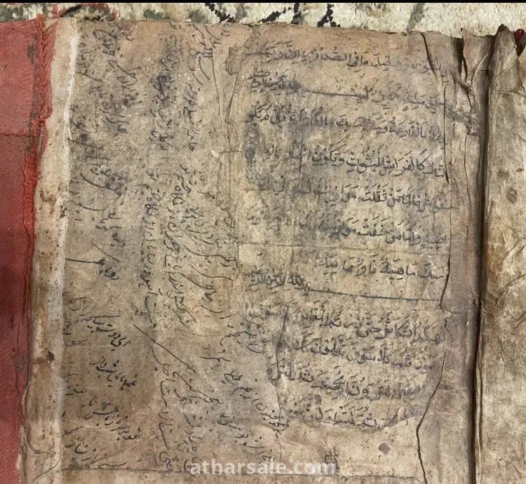 نسخة من القرآن الكريم مخطوط يدوي يوجد وثيقة تقييم معتمدة في الصور المرفقة