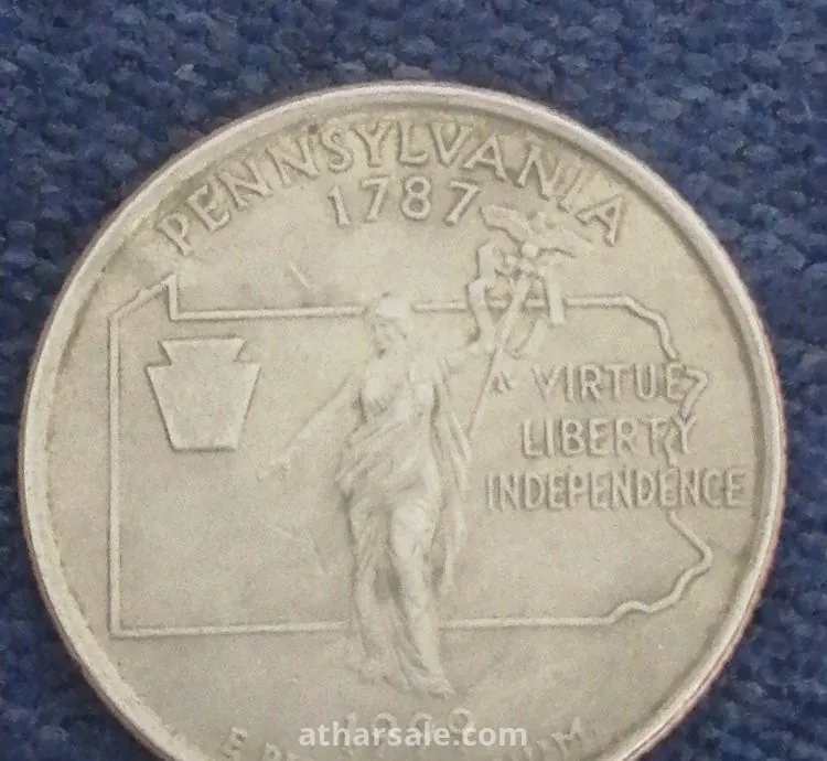 Five Cents of Jefferson's Era in 2000 and quarter A dollar  Washington era in 1999