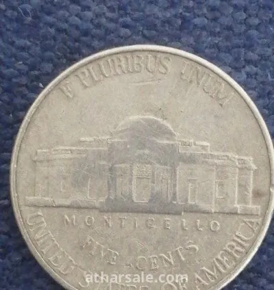 Five Cents of Jefferson's Era in 2000 and quarter A dollar  Washington era in 1999