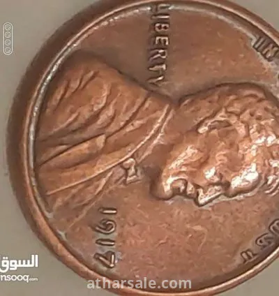 عملة من النوادر بها خطأ مطبعي عمر العملة 116سنة 5