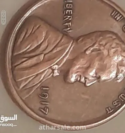 عملة من النوادر بها خطأ مطبعي عمر العملة 116سنة 4
