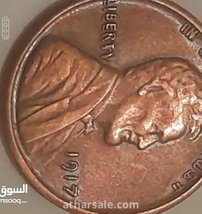 عملة من النوادر بها خطأ مطبعي عمر العملة 116سنة 3