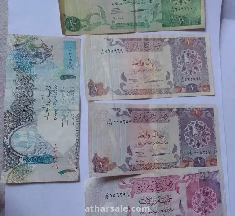 عملات متنوعة لدولة قطر . . قديمة وملغاة. . فئة واحد . . وخمسة . وعشرة ريالات