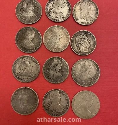 عملات معدنية فضية فرنسي وإسباني