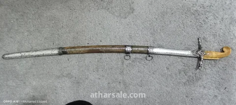 Sword Type: Heavy Cavalry Sabre, the renowned Model 1822.  Country of Origin: France - the prestigious Klingenthal factory.  Era: First half of the 19th century (circa 1823-1835).  Blade: A long, original steel blade (over one meter long), featuring a fuller groove for balance and rigidity. The blade is in excellent condition and retains its original flexibility.  Stamps and Marks: The sword bears four historical stamps confirming its authenticity and quality:  The Balance Stamp: The emblem of