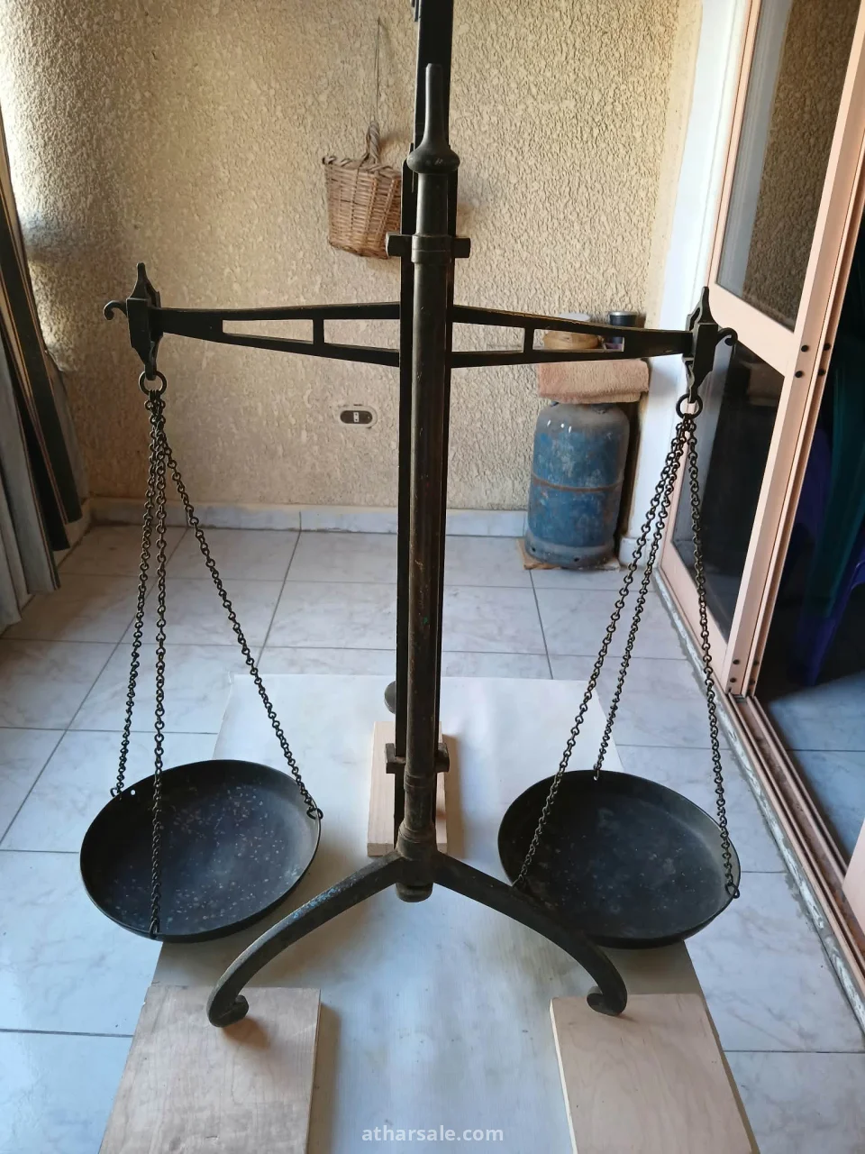 An authentic, traditional two-pan scale crafted from premium brass, evoking the atmosphere of trade and commerce;  Scale Specifications: Height: 73 cm Weight: 9 kg (pure brass) Country of Manufacture: England Year of Manufacture: 1820 Ownership: Currently held by the owner; this scale is part of a multi-generational family collection.   For contact: Dr. Gamal Mostafa, Arab Republic of Egypt, Sharqia Governorate, Zagazig. WhatsApp: 01204244452